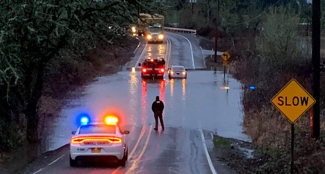 Driver Rescued From Flooded Highway